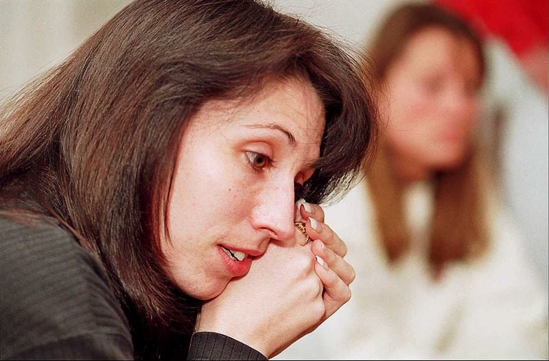 Felicia Shotkowski wipes away tears as she talks about her husband Dave Saturday afternoon March 25 1995 in Hoffman Estates Ill Dave Shotkowski 30 a right handed replacement pitcher for the Atlanta Braves was found dead on the sidewalk after an apparent robbery attempt Friday evening March 24 in West Palm Beach Fla Behind her is his sister Susan Shotkowski AP Photo Ellen Domke Sun Times