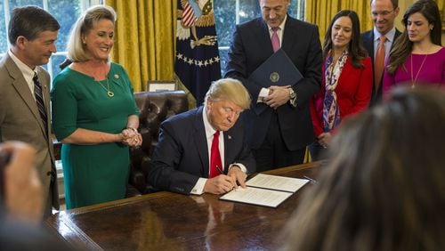 President Donald Trump on Monday signed a revised executive order temporarily barring travel from six Muslim-majority countries and pausing the refugee resettlement program. (Feb. 3, 2017. Al Drago/The New York Times)
