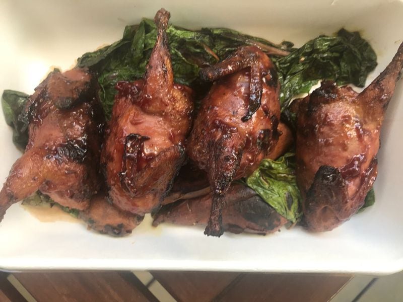 Strawberry-lacquered quail is among the entrees on Deer and the Dove’s dinner takeout menu. Look for rabbit to make an appearance soon. LIGAYA FIGUERAS / LIGAYA.FIGUERAS@AJC.COM