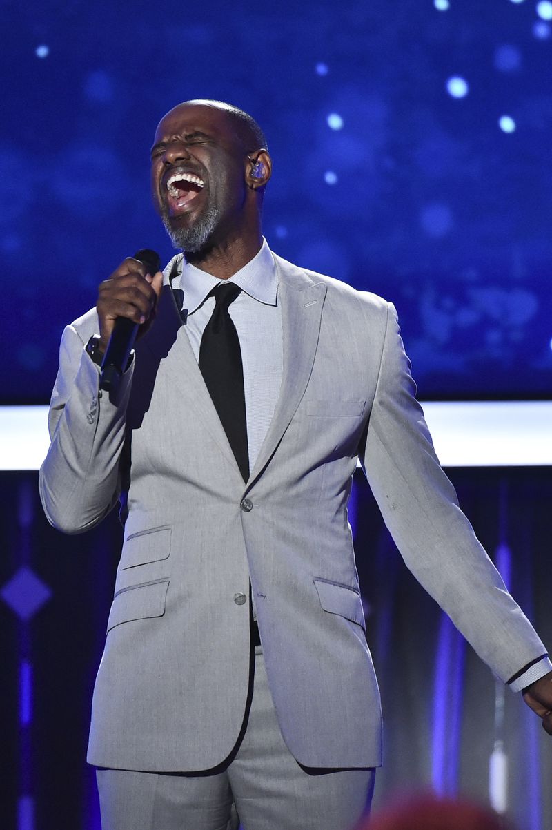 Brian McKnight sings at AARP's 16th Annual Movies for Grownups Awards at the Beverly Wilshire Hotel on Monday, Feb. 6, 2017 in Beverly Hills, California.(Photo by Vince Bucci/Invision/AP)