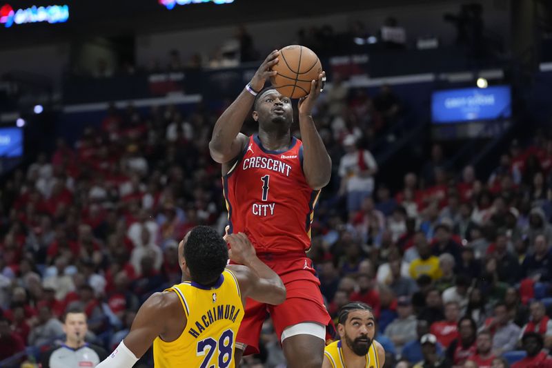 New Orleans Pelicans forward Zion Williamson (1) goes to the basket over Los Angeles Lakers forward Rui Hachimura (28) in the second half of an NBA basketball play-in tournament game Tuesday, April 16, 2024, in New Orleans. The Lakers won 110-106. (AP Photo/Gerald Herbert)