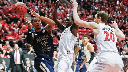 Georgia Tech forward Nick Jacobs loses the ball while being guarded San Diego State forward Angelo Chol and Matt Shrigley during the first half of an NCAA college basketball game in the men’s NIT on Wednesday, March 23, 2016, in San Diego. (AP Photo/Lenny Ignelzi)