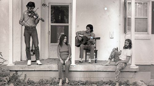 Musicians Townes Van Zandt (from left), Susanna Clark, Guy Clark and Daniel Antopolsky play some tunes on the Clarks’ porch in Nashville in 1972. Contributed by Al Clayton