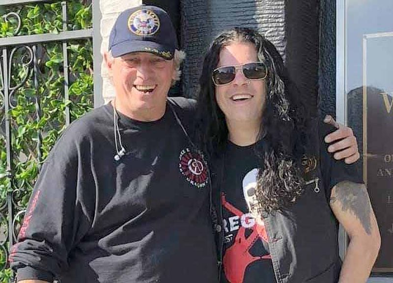 James McAuliffe (left) served as a driver for the band Red Dragon Cartel, including singer Darren James Smith. (Photo: Special to The AJC)