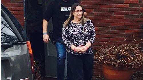 Josh Waites, the chief investigator for the state Department of Revenue, arrests Hapeville City Councilwoman Ruth Barr on Jan. 11. The arrest on a perjury charge was part of a state fraud investigation into Barr’s tax preparer’s business.