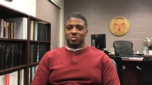 Ex-Falcon and Atlanta resident Warrick Dunn is the founder of “Homes for the Holidays,” a program by Warrick Dunn Charities that provides down payments on houses for single parents and struggling families. Contributed by Angela Tuck