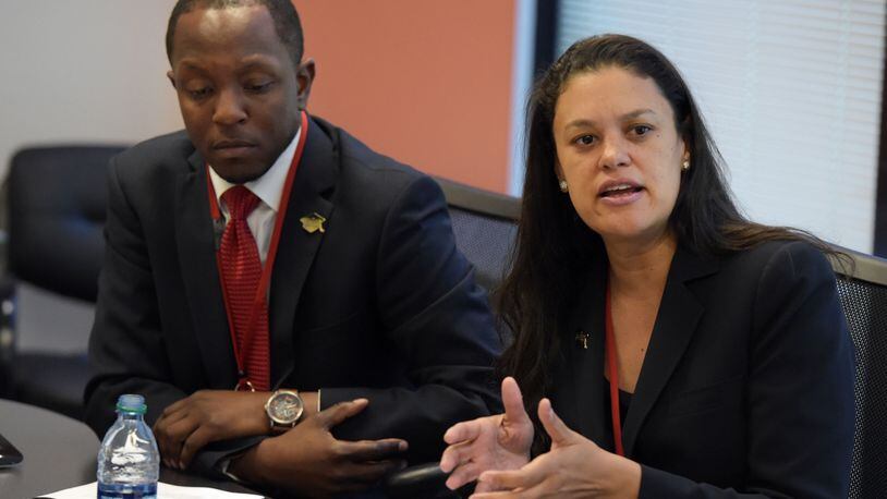 The head of an Atlanta teacher’s group says the search for a new school chief should be more open than the process used to hire Meria Carstarphen in 2014. Carstarphen is shown here with former APS school board Chair Courtney English.