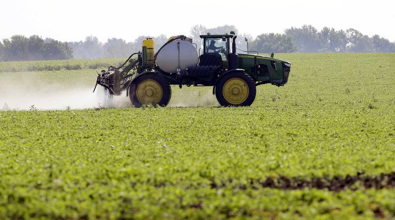 FILE - A soybean field is sprayed in Iowa, July 11, 2013. Bayer, the manufacturer of a popular weedkiller, won support Wednesday, April 24, 2024, from the Missouri House for a proposal that could shield it from costly lawsuits alleging it failed to warn customers its product could cause cancer. (AP Photo/Charlie Neibergall, File)
