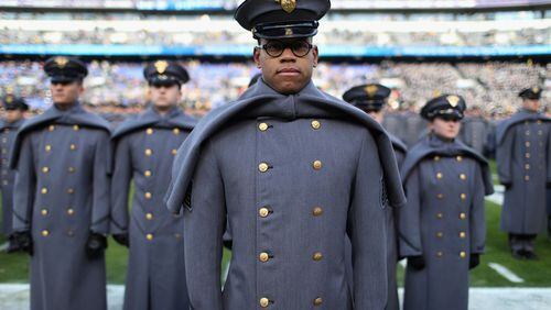Army cadets stand on the field before the start of the Army-Navy football game December in Baltimore. (Rob Carr/Getty Images)