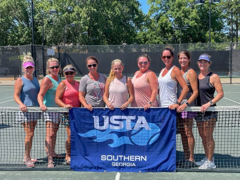 Kelly Roberts, second from left, with members of one of her USTA senior league teams. Many of the women in the leagues have become lifelong friends and rejoin the same teams season after season.