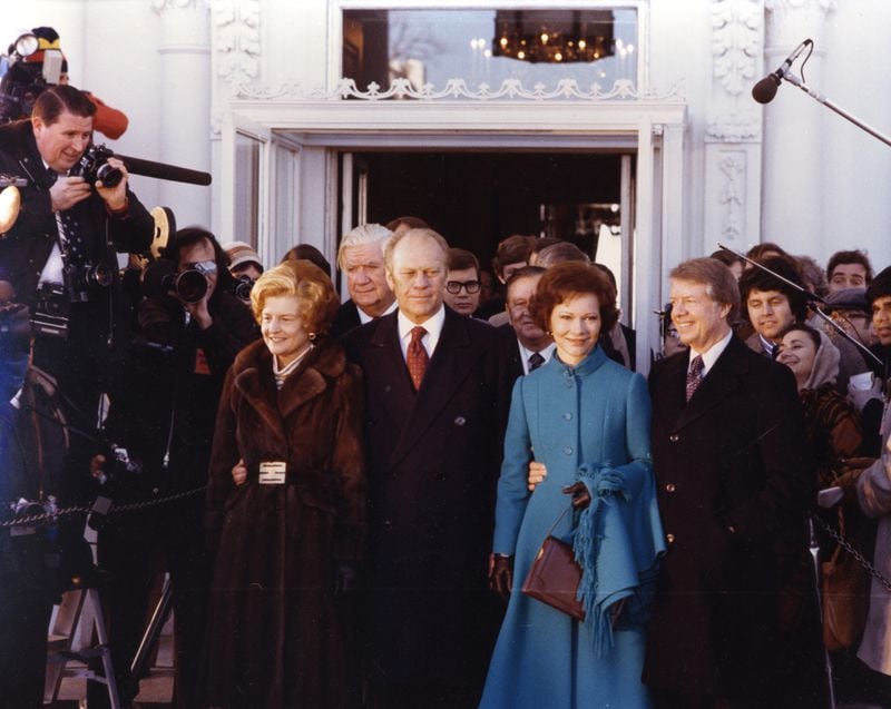 Outgoing President Gerald Ford and his wife Betty pose with newly inaugurated President Jimmy Carter and his wife Rosalynn on Jan. 20, 1977. (AJC file)