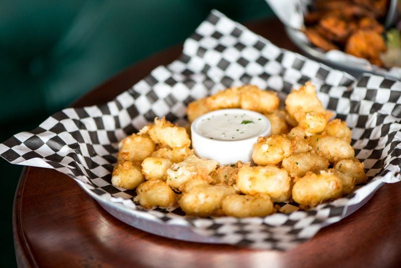 Black Sheep Tavern and Oyster Room Cheese Curds with white cheddar, beer batter, and ranch. Photo credit- Mia Yakel.