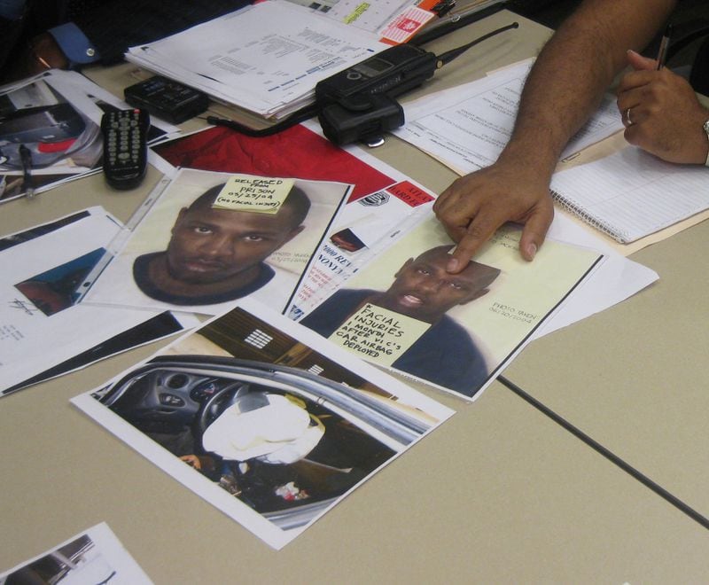 Investigators show photos of Torico Jackson, who was indicted in 2011 for the May 2004 murder of John Ray. Investigators say the two pictures are among the evidence that led them to bring charges against Jackson.