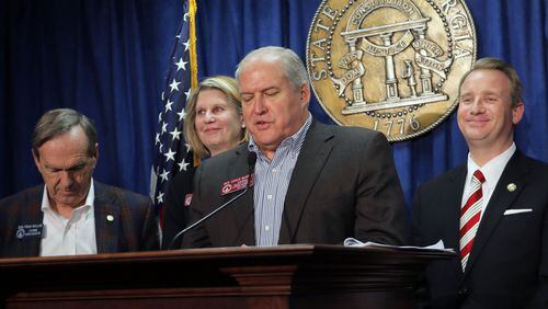 Senator John Albers (from right), R - Roswell, Rep. Chuck Martin, R - Alpharetta, House Speaker Pro-Tempore Jan Jones, R - Milton, and Senator Fran Millar, R - Atlanta, at a press conference Tuesday on the final passage of legislation addressing Fulton County tax exemptions. A number of homestead exemptions that passed for North Fulton and the schools will let people improve their homes without losing the lower assessed value. BOB ANDRES /BANDRES@AJC.COM