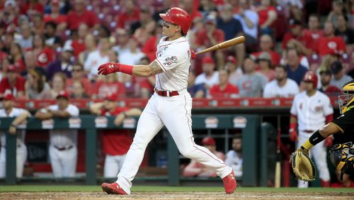 Derek Dietrich of the Cincinnati Reds  hits a home run in the 7th inning. (Photo by Andy Lyons/Getty Images)