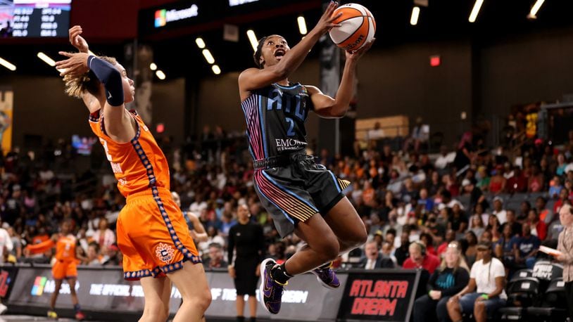 Guard Aari McDonald (right) scored 11 points, but the Dream lost to the Liberty on Sunday in their final game of the WNBA season. The Dream narrowly missed a playoff berth. (Jason Getz file photo / Jason.Getz@ajc.com)
