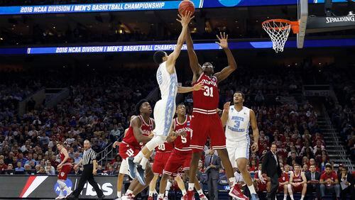 This was the rare non-3-point shot by Marcus Paige. (AP Photo/Matt Rourke) North Carolina's Marcus Paige, left, releases a shot against Indiana's Thomas Bryant during the first half of an NCAA college basketball game in the regional semifinals of the men's NCAA Tournament, Friday, March 25, 2016, in Philadelphia. (AP Photo/Matt Rourke)