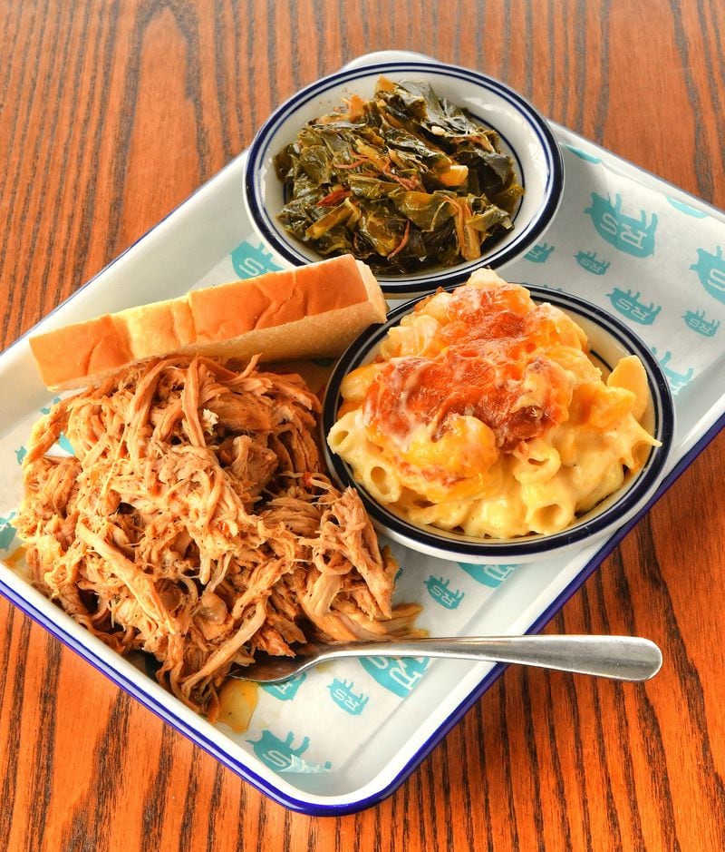 Pitmaster Rodney Scott is known for his pork, seen here on Rod's Original Whole Hog Pork Plate, but his sides, such as collards and macaroni and cheese, deserve some attention. (Chris Hunt for The Atlanta Journal-Constitution)