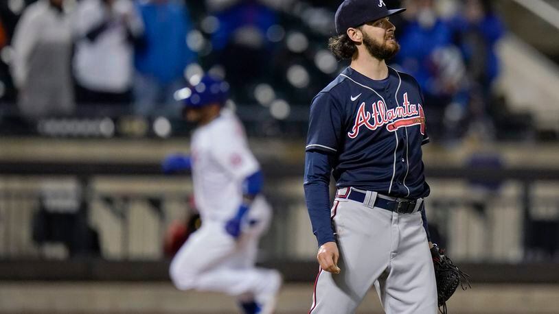 Atlanta Braves' Ian Anderson reacts as New York Mets' Jonathan Villar runs the bases on a home run during the fifth inning of a baseball game Saturday, May 29, 2021, in New York. (AP Photo/Frank Franklin II)