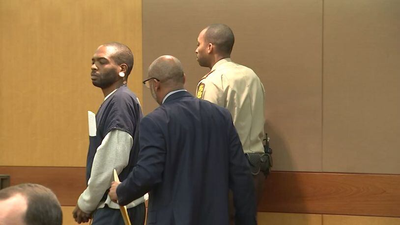 Uber Eats driver Robert Bivines appeared in court Tuesday. He is accused of killing Ryan Thornton outside his Buckhead condominium.