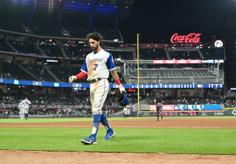 Braves shortstop Dansby Swanson (7) walks off field after 5-3 loss in the 10th inning to the Miami Marlins Monday, April 12, 2021, at Truist Park in Atlanta. (Hyosub Shin / Hyosub.Shin@ajc.com)