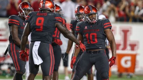 Houston defensive tackle Ed Oliver celebrates after a play against Louisville in 2016.
