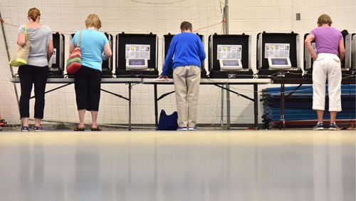 DeKalb County voters go to the polls at Henderson Mill Elementary School on Georgia’s primary election day on May 24, 2016. HYOSUB SHIN / HSHIN@AJC.COM