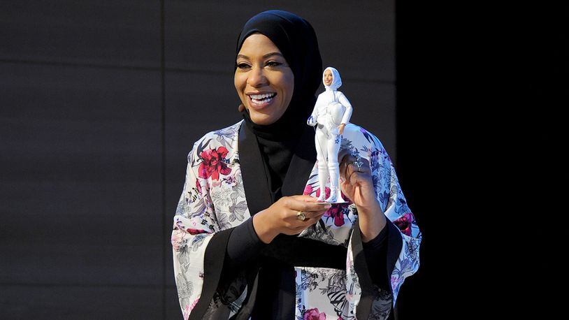 U.S. Olympic Medalist Ibtihaj Muhammad speaks onstage a new Barbie doll in her image during Glamour Celebrates 2017 Women Of The Year Live Summit at Brooklyn Museum on November 13, 2017 in New York City.