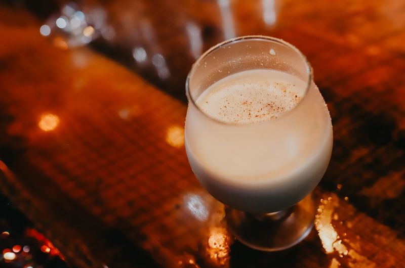 Third Door on the Marietta Square pays homage to National Lampoon's Christmas vacation with its pop-up menu, featuring eggnog with a blend of creamy sherry and nutty bitters.  Courtesy of Whitney Flockart Photography