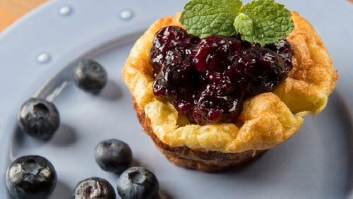 Finished Dutch Puff with blueberry compote, blueberries, and basil. (Isaac Hale/Minneapolis Star Tribune/TNS)