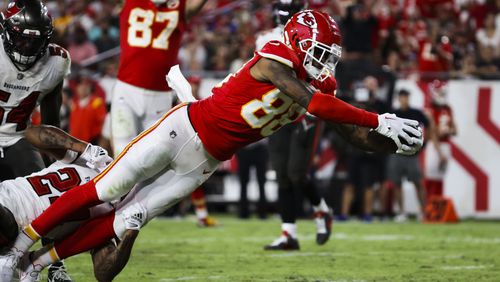 Kansas City Chiefs tight end Jody Fortson (88) scores a touchdown on a 10-yard pass from Patrick Mahomes (15) as he gets by Tampa Bay Buccaneers cornerback Carlton Davis III (24) during third-quarter action at Raymond James Stadium on Sunday, Oct. 2, 2022, in Tampa. (Dirk Shadd/Tampa Bay Times/TNS)