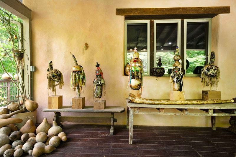 Gourd sculptures on display on the porch of Michael Pierce's home in Farmington.
(Courtesy of Terry Allen)