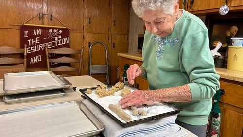 Cecilia Pruitt, 94, bakes cookies for the Blairsville Sorghum Festival. Olivia Wakim/olivia.wakim@ajc.com