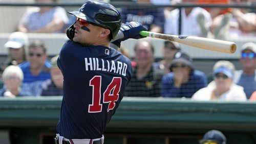Sam Hilliard of the Braves hits a single against the Detroit Tigers in the first inning of a spring training baseball game, Wednesday, March 22, 2023, in Lakeland, Fla. (AP Photo/John Raoux)