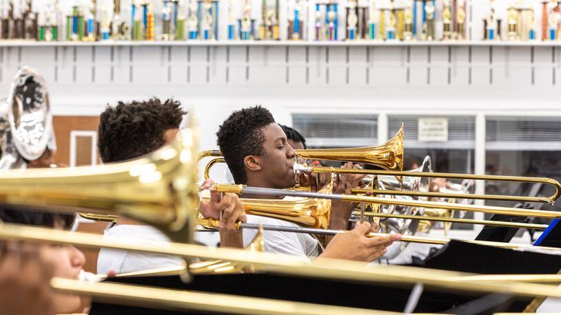 The Sound of Dutchtown high school marching band practices at Dutchtown High School in Hampton on Thursday, May 25, 2023. The band will play at a D-Day commemoration ceremony in France. (Arvin Temkar / arvin.temkar@ajc.com)