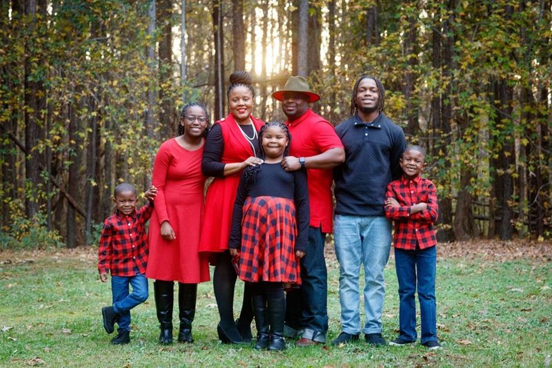 Dr. Cornelius Daniel and his wife, Melanie, assumed responsibility for teenagers Myles and Marina Daniel after their parents, Martin and Trina Daniel — Cornelius Daniel's uncle and aunt — died on July 6, 2021, with COVID-19. The Daniel family from left: Caiden, 5; Marina, 16; Melanie, 33; Christian, 10; Cornelius Sr., 32; Myles, 19; Cornelius Jr., 7. (Courtesy of Daniel family)