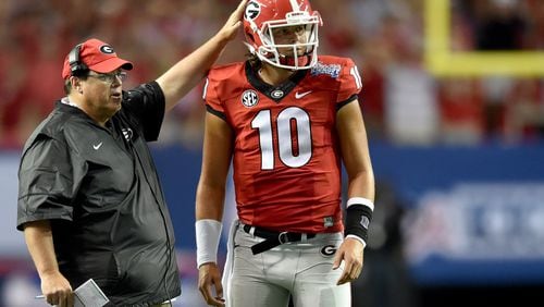 Georgia offensive coordinator Jim Chaney needs improvement from quarterback Jacob Eason and the offense as a whole. (Brant Sanderlin / AJC file photo)