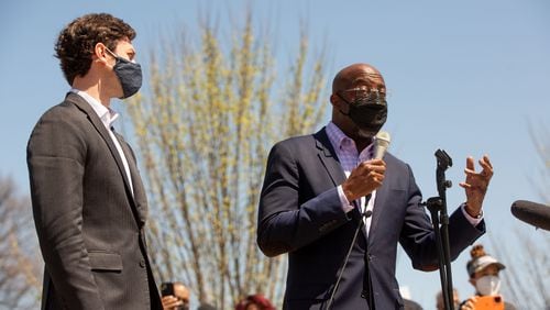 U.S. Sens. Raphael Warnock, right, and Jon Ossoff, shown speaking at a rally in March near the state Capitol, pushed in a letter to “close the coverage gap” in Georgia and other states that have refused to expand Medicaid under the Affordable Care Act. (Photo: Steve Schaefer for The Atlanta Journal-Constitution)