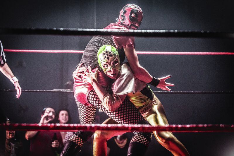An immigration lawyer (Fawzia Mirza, in green mask) finds herself drawn into the wrestling subculture in the romantic dramedy “Signature Move,” screening at the Out on Film Festival at 7 p.m. Oct. 6 at OutFront Theatre Company. CONTRIBUTED BY OUT ON FILM