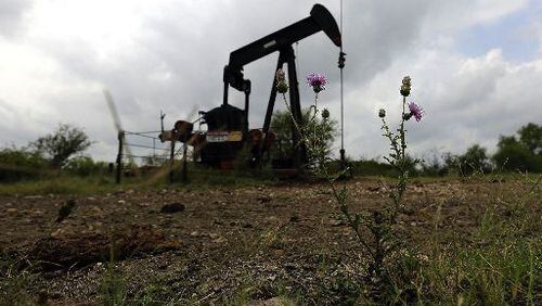 An oil well pump jack in South Texas. (AP Photo/Eric Gay)