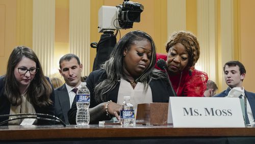 Former Georgia election worker Wandrea ArShaye Moss, left, is comforted by her mother, Ruby Freeman, as she testifies Tuesday during the fourth hearing held by the House committee investigating the Jan. 6, 2021, attack on the Capitol. (Shuran Huang/The New York Times)