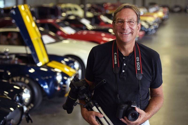 Jeffrey Lorber is an automotive photographer. He stands in the garage of Gateway Classic Cars in Alpharetta on Friday, July 20. Jenna Eason / Jenna.Eason@coxinc.com