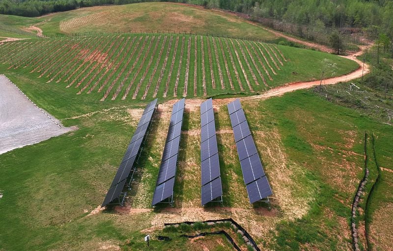 This aerial photo shows solar panels at Yonah Mountain Vineyards in Cleveland.  Ga. HYOSUB SHIN / HSHIN@AJC.COM