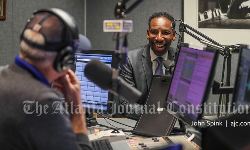 Atlanta Councilman and mayoral candidate Andre Dickens visits the WSB studios early Wednesday after declaring he had secured a runoff spot in the Atlanta mayor's race. (John Spink/AJC)
