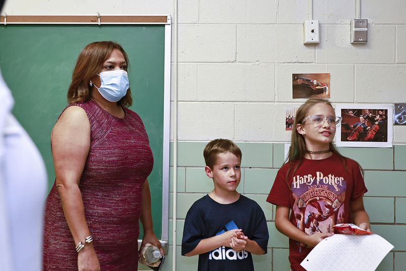 DeKalb Schools interim Superintendent Vasanne Tinsley talks to seventh grade student Layla Murray and her brother Jackson at Wadsworth Magnet School open house on Wednesday, August 3, 2022. (Natrice Miller/natrice.miller@ajc.com)