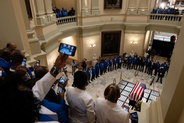 200729-Atlanta-People crowd the balcony to get a view as members of Phi Beta Sigma fraternity sing the fraternity hymn during a ceremony for Rep. John Lewis in the Rotunda of the State Capitol on Wednesday evening July 29, 2020. Ben Gray for the Atlanta Journal-Constitution