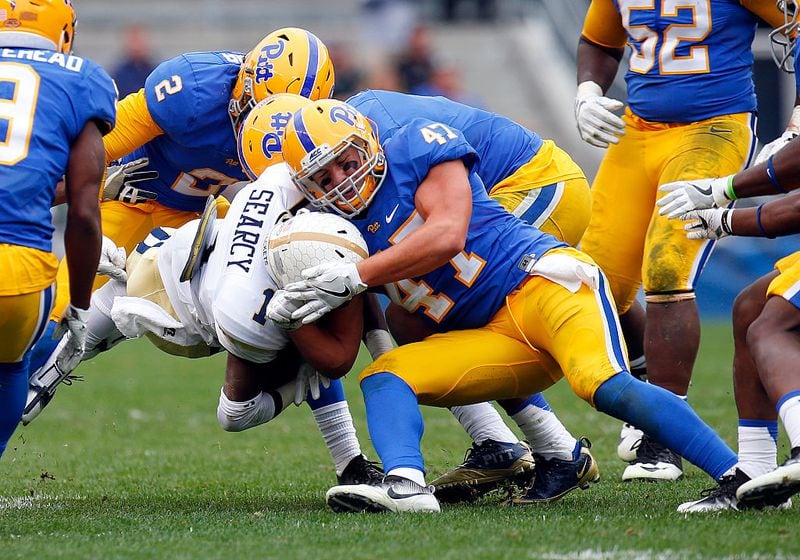 PITTSBURGH, PA - OCTOBER 08: Matt Galambos #47 of the Pittsburgh Panthers tackles Qua Searcy #1 of the Georgia Tech Yellow Jackets during the game on October 8, 2016 at Heinz Field in Pittsburgh, Pennsylvania. (Photo by Justin K. Aller/Getty Images)
