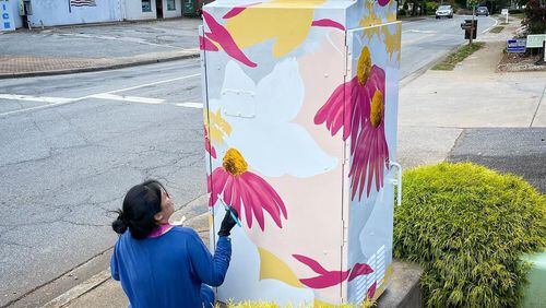 In Dec. 2021, Christina Kwan completed a beautiful mural on a utility box at the corner of Woodstock and Canton Road in Roswell. (Courtesy Roswell Arts Fund)