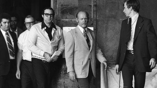 William A.H. Williams (at left in white jacket, shown in 1974), the man who kidnapped Atlanta Constitution editor Reg Murphy in 1974, called the Journal-Constitution Feb. 20, 2014, to comment on the 40th anniversary of the event. Why did he choose Murphy as a target? “I guess I didn’t like his editorials,” Williams, now 73 and living in Las Vegas, said.