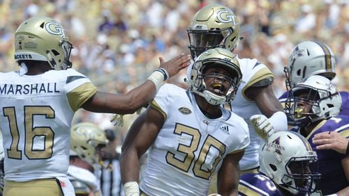 Georgia Tech running back KirVonte Benson (30) celebrates with teammates after he scored a touchdown against Alcorn State in the first half of the Georgia Tech home opener Saturday, Sept. 1, 2018, at Bobby Dodd Stadium in Atlanta.